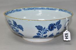 AN EIGHTEENTH CENTURY DUTCH DELFT PUNCH BOWL, circa 1760, painted with flowers and oriental style