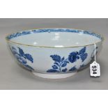 AN EIGHTEENTH CENTURY DUTCH DELFT PUNCH BOWL, circa 1760, painted with flowers and oriental style