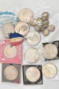 A BAG CONTAINING COINS AND COMMEMORATIVES, with over 50 silver three pence coins .925 and .500,