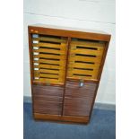 AN EARLY TO MID CENTURY OAK TWIN DIVISION TAMBOUR FRONT FILING CABINET, the left side with 16