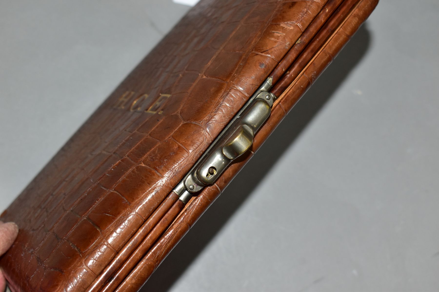 A TAN CROCODILE SKIN WRITING CASE, the cover embossed in gilt H.C.E., bears label for Ward to the - Image 5 of 7