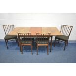 AN 'A YOUNGER LTD' MID-CENTURY TEAK EXTENDING DINING TABLE, with a single fold out leaf, on