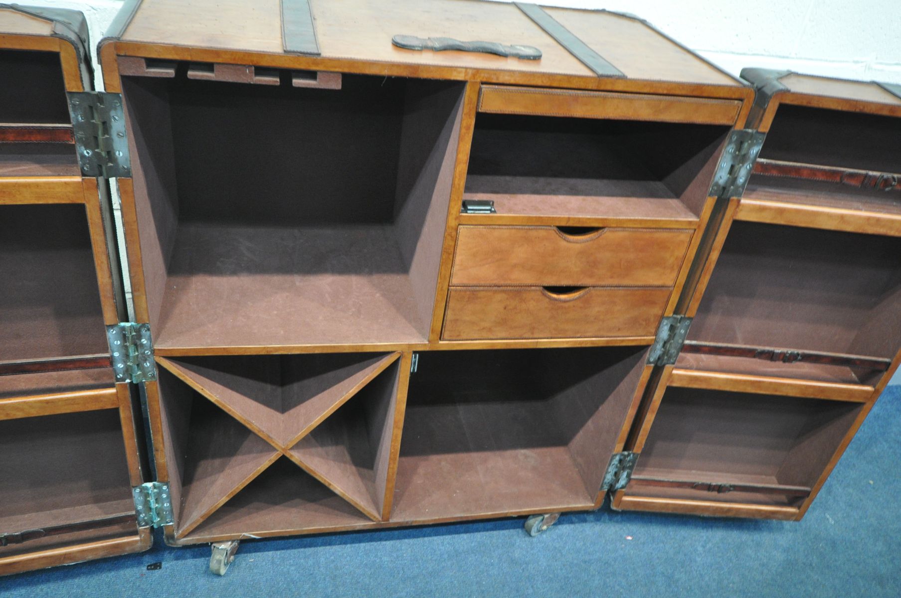 A BROWN LEATHER WRAPPED COCKTAIL CABINET, possibly made by 'Coach house', the two door enclosing - Image 4 of 10