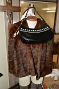 A JANE SHILTON BLACK LEATHER HANDBAG WITH DUST BAG, a brown fur cape with Browns of Chester label