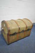 A VINTAGE CANVAS AND WOODEN BOUND DOME TOP TRUNK, with twin leather handles, width 80cm x depth 53cm