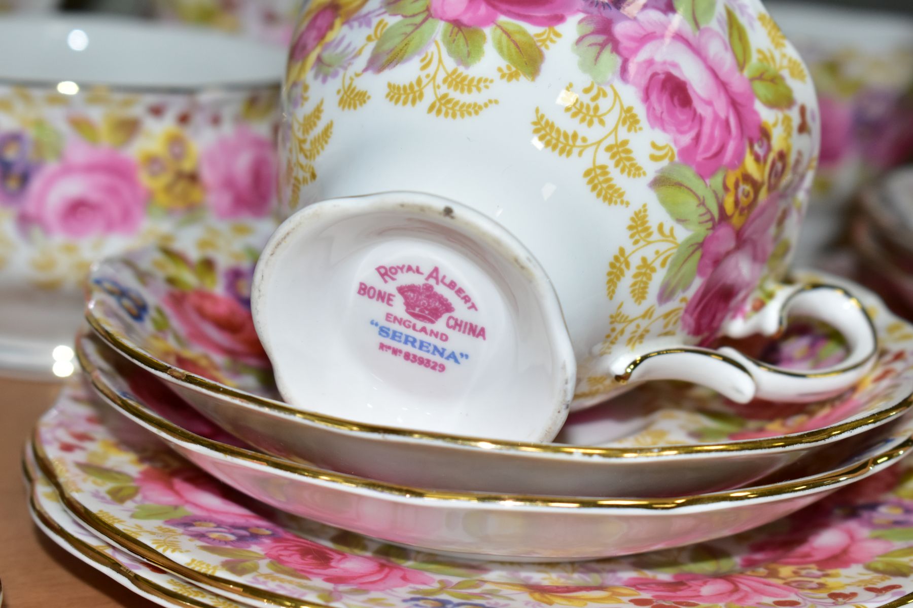 A ROYAL ALBERT SERENA TEASET, comprising cake plate (hairline), milk jug, sugar bowl, six teacups, - Image 2 of 4