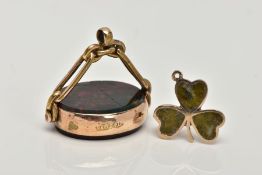 A 9CT GOLD BROOCH AND A YELLOW METAL FOB, clover brooch inlayed with jadeite, also fitted with a