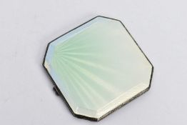 A SILVER GUILLOCHE ENEMAL COMPACT, of a square form, detailed with a pale blue and green graduated