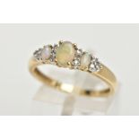 A 9CT GOLD OPAL AND DIAMOND RING, an oval opal and two marquise shaped opals set with ten round