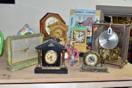 TWELVE ASSORTED MANTEL AND WALL CLOCKS, mostly quartz movement with resin cases, includes an onyx