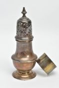 A SILVER SUGAR CASTER AND A NAPKIN RING, plain polished sugar caster with a pierced cover,