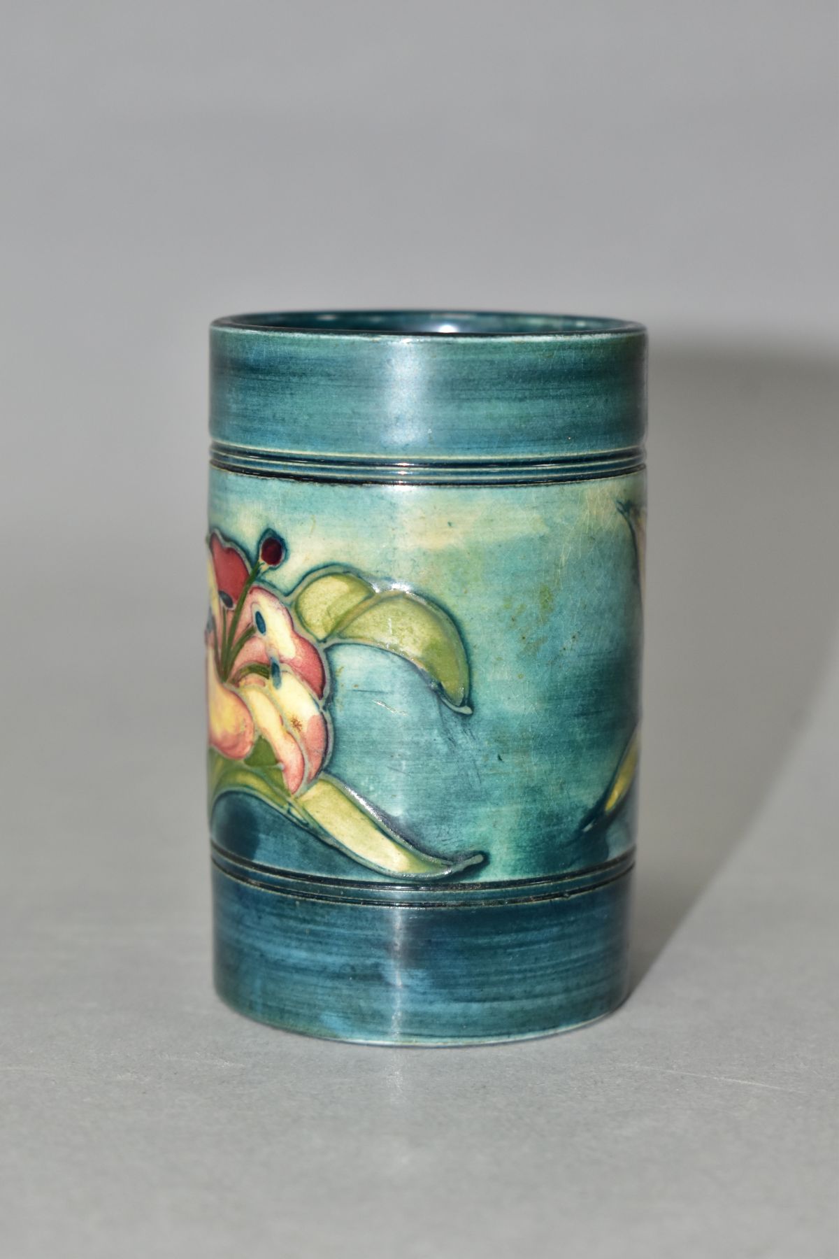 A MOORCROFT POTTERY CYLINDRICAL VASE, banded and decorated with tube lined Freesias on a blue - Image 2 of 6