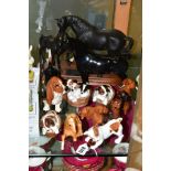 A COLLECTION OF ROYAL DOULTON AND BESWICK DOG AND HORSE FIGURES, comprising four Royal Doulton