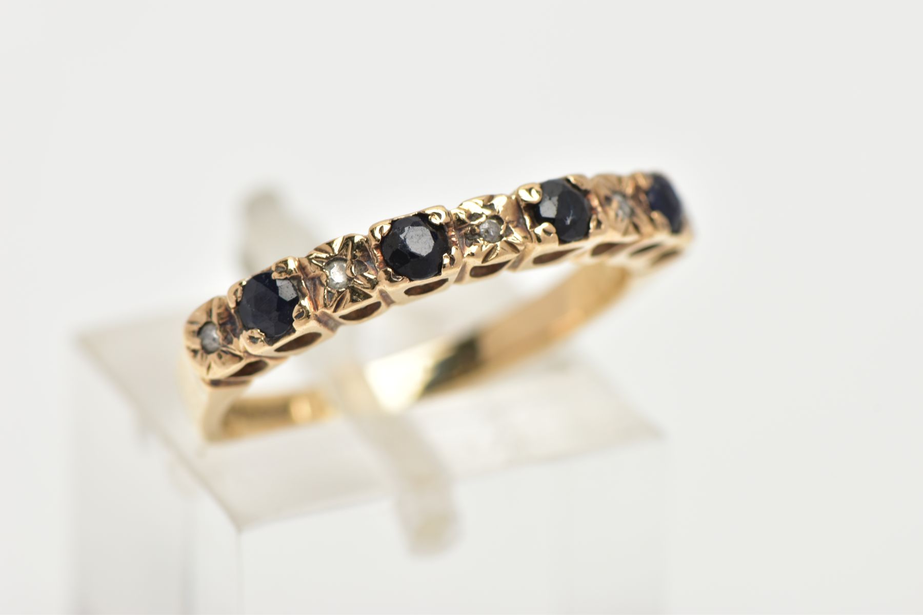 A 9CT GOLD SAPPHIRE AND DIAMOND HALF ETERNITY RING, designed with four circular cut deep blue - Image 4 of 4