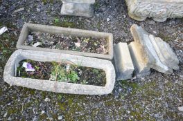 TWO COMPOSITE RECTANGULAR GARDEN PLANTERS, 66cm and 68cm long respectively, a pair of composite