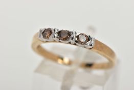 A 9CT GOLD THREE STONE DIAMOND RING, three brown round brilliant cut diamonds, approximate total