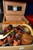 A HUMIDOR WITH A BOX OF PIPES AND SMOKING RELATED ITEMS, to include a modern humidor with drawer