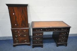 A MAHOGANY PEDESTAL DESK, with a brown leather writing surface, and nine drawers, width 122cm x