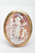 A LARGE 9CT GOLD CAMEO BROOCH, of an oval form, depicting a Grecian lady pouring water in a garden