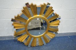 A 'GALLERY DIRECT' CONTEMPORARY GILT SUNBURST WALL MIRROR, largest diameter 107cm x central mirror