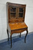 A 19TH CENTURY ROSEWOOD AND MARQUETRY BONHEUR DE JOUR, incorporating various brass mounts, the top