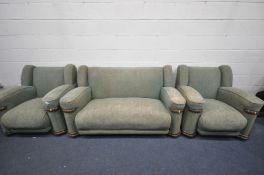 AN ART DECO THREE PIECE LOUNGE SUITE, with its original veined effect green upholstery, comprising a