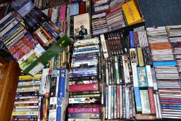 NINE BOXES OF DVDS AND CDS, approximately three hundred DVDs and DVD box sets, many still sealed,