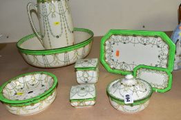 A ROYAL DOULTON EIGHT PIECE WASH AND DRESSING TABLE SET, pattern number D3070, comprising wash jug