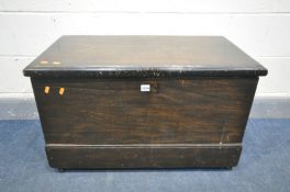 A STAINED PINE TOOL CHEST, on casters, width 85cm x depth 45cm x height 52cm