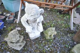 THREE COMPOSITE GROTESQUES all seated, the largest height 56cm