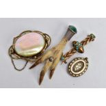 THREE BROOCHES AND A PENDANT, to include a Victorian yellow metal bar brooch designed with an oval