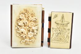 TWO CARVED IVORY AID MEMOIRS, the first with a decorative carved bunch of flowers to the front, with