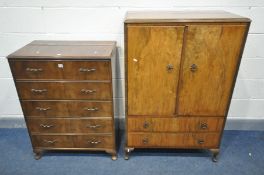AN ALFRED COX WALNUT TWO DOOR CUPBOARD, over two drawers, width 85cm x depth 47cm x height 127cm,