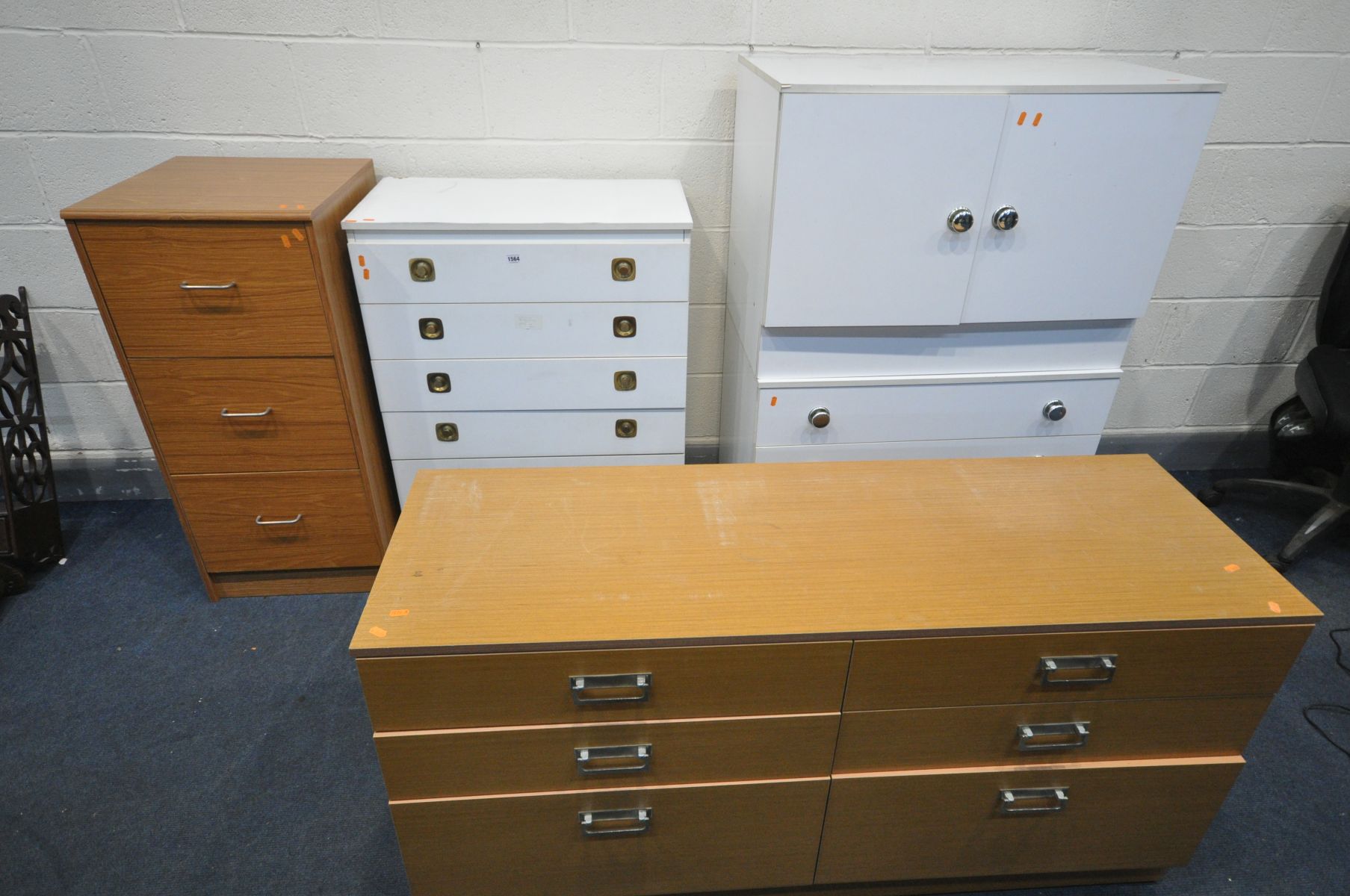 FOUR VARIOUS PIECES OF BEDROOM FURNITURE, to include a low teak effect chest of six drawers, a