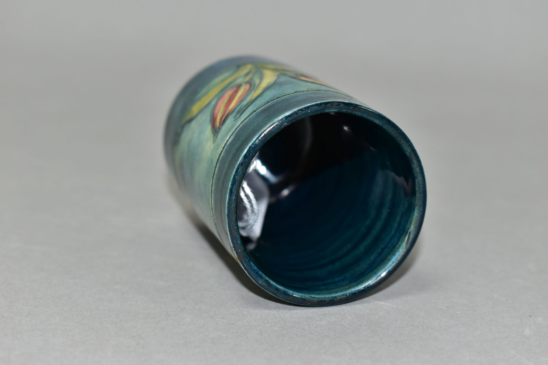 A MOORCROFT POTTERY CYLINDRICAL VASE, banded and decorated with tube lined Freesias on a blue - Image 5 of 6