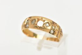 AN 18CT GOLD DIAMOND AND SEED PEARL STAR SET RING, set in a polished yellow gold domed tapered band,
