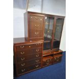 A WILLIAM LAWRENCE MAHOGANY BEDROOM SUITE, comprising a tall chest of five drawers, a pair of two