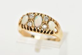 A YELLOW METAL OPAL AND DIAMOND RING, designed with three oval cut opal cabochons, interspaced