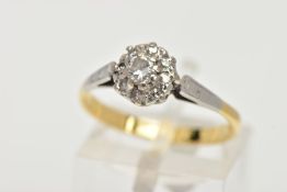 AN 18CT GOLD DIAMOND CLUSTER RING, comprising nine round brilliant cut diamonds, approximate total