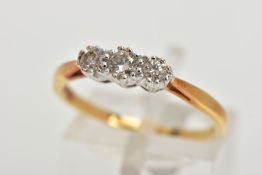 AN 18CT GOLD THREE STONE DIAMOND RING, three round brilliant cut diamonds, approximate gross