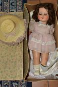 A VINTAGE BISQUE JOINTED DOLL, sleeping eyes, closed painted mouth, painted eyebrows and