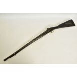 A PERCUSSION RIFLE, made in a native armoury of inferior quality and in poor condition, its 30”