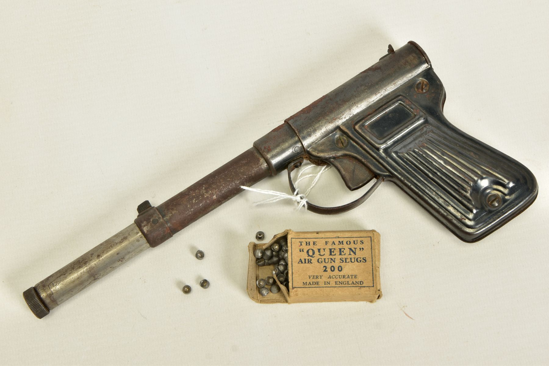 A .177'' BRITON PRESSED STEEL 'GAT' TYPE AIR PISTOL, complete with pellet insertion rod and a packet