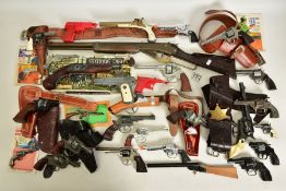 A LARGE COLLECTION OF TOY PISTOLS CONSISTING OF:- a cast iron cap pistol marked Monak, an under-