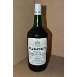 WHISKY, one 40 fl. oz. bottle of BLACK & WHITE Special Blend of Buchanan’s Choice Old Scotch Whisky,
