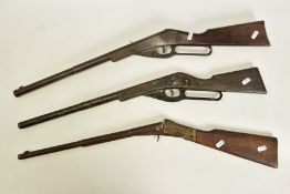 THREE EARLY TIN PLATE AIR GUNS, the first is a Daisy marked ‘Daisy Toy Gun Rogers Arkansas Model