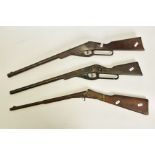 THREE EARLY TIN PLATE AIR GUNS, the first is a Daisy marked ‘Daisy Toy Gun Rogers Arkansas Model