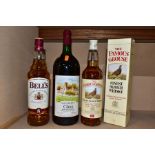 WHISKY & WINE comprising one bottle of The Famous Grouse, 40% vol. 70cl, one bottle of Bell’s aged 8