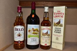 WHISKY & WINE comprising one bottle of The Famous Grouse, 40% vol. 70cl, one bottle of Bell’s aged 8