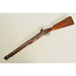 AN ANTIQUE SMOOTH BORE PERCUSSION CARBINE, fitted with a 21'' barrel in approximately 14 bore, it is